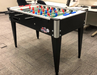 Roberto Foosball table in a gaming room Logo View in an office