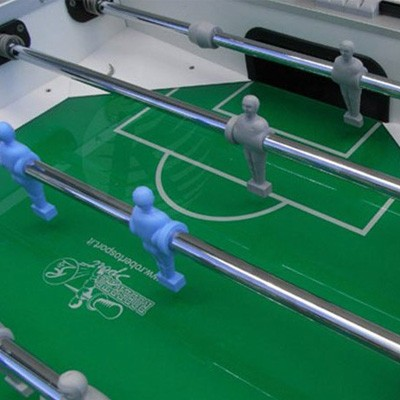 Grey and Blue foosball people on a foosball table